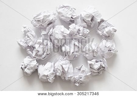 Waste Recycling. Flat Lay Of Crumpled Paper Ball Pile On White Surface. Abstract Background.