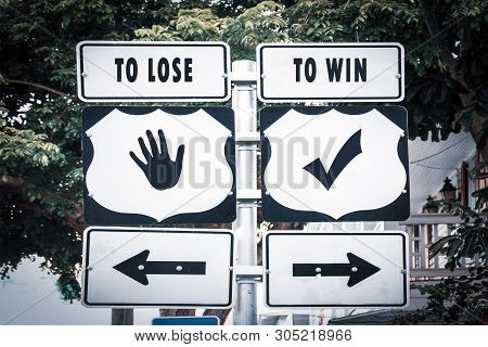 Street Sign The Direction Way To Win Versus To Lose