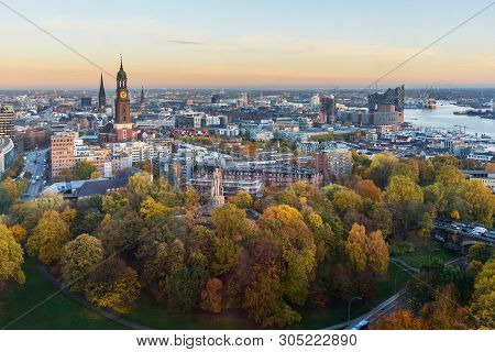 View Of Hamburg With Michel, Harbor, And New Elbphilharmony On Sunset In Autumn. Germany