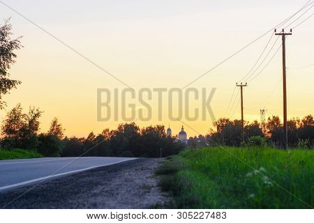 Landscape with the Image of a Country Road at sunset