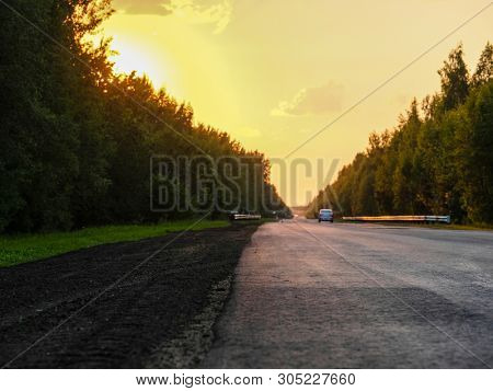 Landscape with the Image of a Country Road at sunset
