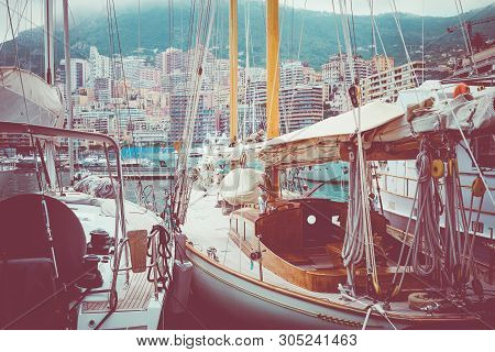 La Condamine, Monaco - June 04, 2019: Yachts Docked At Port Hercules In La Condamine Harbour. Citysc