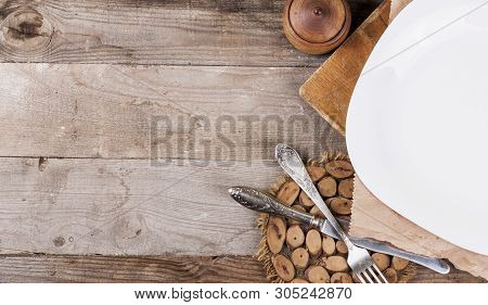 Wooden Kitchen Equipment On A Dark Wooden Background. View From Above