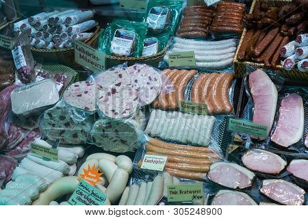Munich, Germany - November 23, 2018 :counters And Showcases Of Butcher Shops At The Viktualienmarkt 