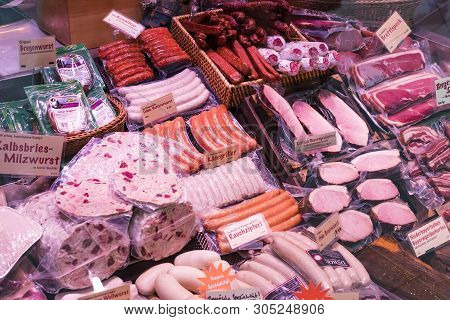 Munich, Germany - November 23, 2018 :counters And Showcases Of Butcher Shops At The Viktualienmarkt 