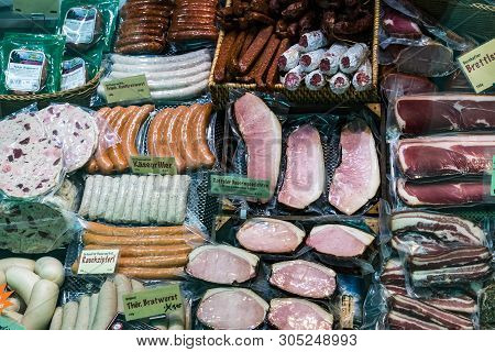 Munich, Germany - November 23, 2018 :counters And Showcases Of Butcher Shops At The Viktualienmarkt 