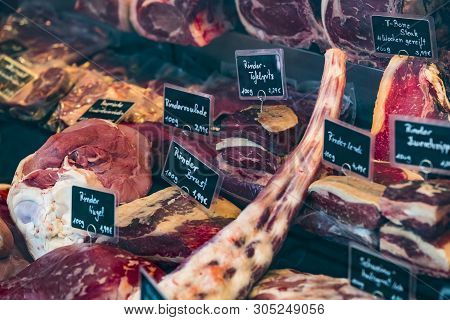 Munich, Germany - November 23, 2018 :counters And Showcases Of Butcher Shops At The Viktualienmarkt 