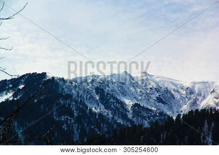 A View Of People Enjoying In Solang Valley, Manali From The Top Of The Hill.