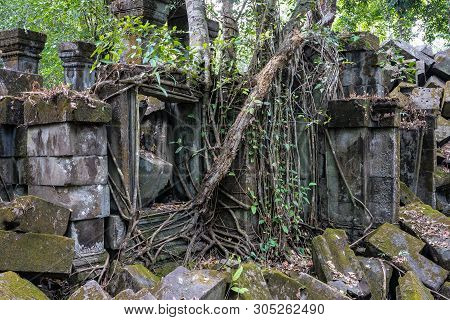 Ruins Of Ancient Beng Mealea Temple Over Jungle, Cambodia. Beng Mealea Is A Temple In The Angkor Wat