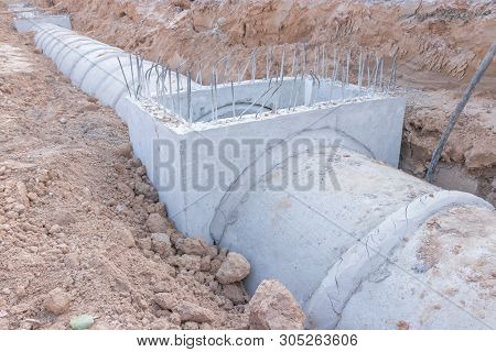 Concrete Drainage Pipe On A Construction Site, Concrete Drainage Tank On Construction Site, Construc