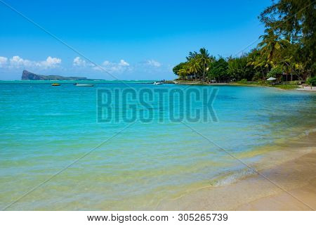 Typical tropical beach Mauritius. Relaxing on remote Paradise beach,typical tropical beach at Mauritius island 