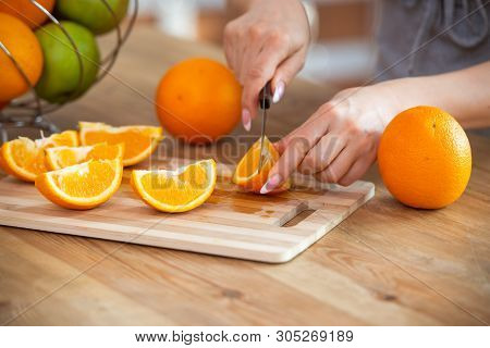 Cooking, Food And Concept Of Veganism, Vigor And Healthy Eating - Close Up Of Female Hand Cutting Or