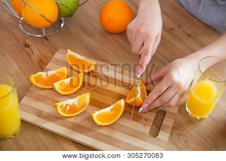 Cooking, Food And Concept Of Veganism, Vigor And Healthy Eating - Close Up Of Female Hand Cutting Or