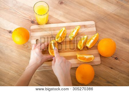 Cooking, Food And Concept Of Veganism, Vigor And Healthy Eating - Close Up Of Female Hand Cutting Or