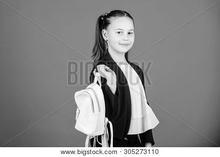 Shopping Time. Cute Child Holding Bag On Blue Background. Little Girl Going Shopping With Daypack Ba