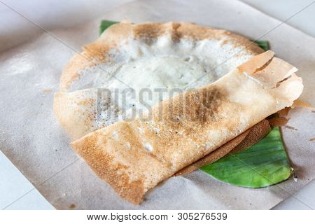 Penang Famous Apom Manis, Served On Banana Leaf.
