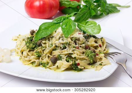 Italian Pasta With Cutlery, Tomato And Basil