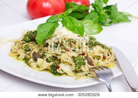 Italian Pasta With Cutlery, Tomato And Basil