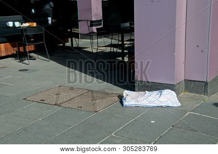 Pillow Of A Homeless Laid On A Street In Sunny Day