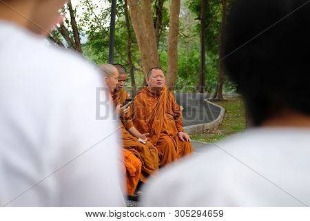 Buddhist Monk Teaching Dhamma To People