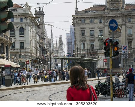 Crowd Of Tourists Strolls In The Cordusio Square