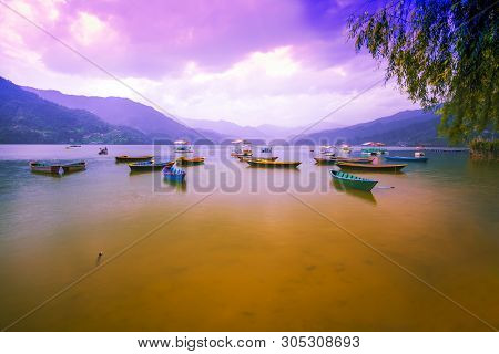 Beautiful Phewa Lake And Colorful Boats. With Sunset Sky.view From Phewa Lake Pokhara Nepal.