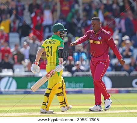NOTTINGHAM, ENGLAND. 06 JUNE 2019: Sheldon Cottrell of West Indies celebrates taking the wicket of David Warner of Australia during the Australia against West Indies, ICC Cricket World Cup match