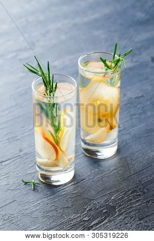 Summer Drinks, Rosemary Pear Cocktails With Ice N Glasses. Refreshing Summer Homemade Alcoholic Or N
