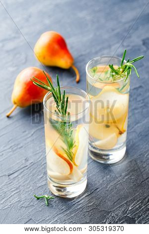 Summer Drinks, Rosemary Pear Cocktails With Ice N Glasses. Refreshing Summer Homemade Alcoholic Or N