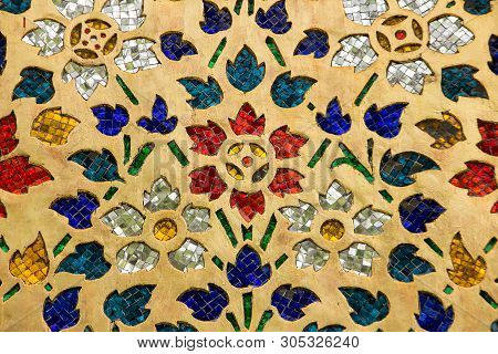 Multi-colored Glass Decorated On The Wall Of The Temple In Thailand.