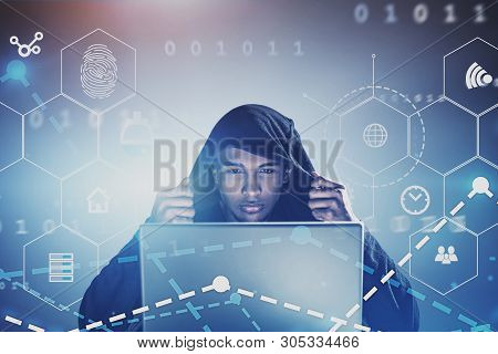 Hacker With Laptop Commiting Online Crime