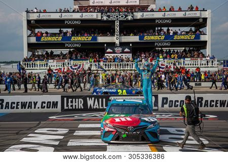 June 02, 2019 - Long Pond, Pennsylvania, USA: Kyle Busch (18) wins the Pocono 400 at Pocono Raceway in Long Pond, Pennsylvania.