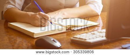 Doctor Woman Writes In The Diary Of Current Affairs In The Dental Clinic