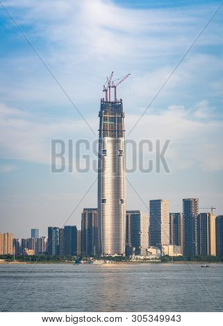 Wuhan Skyline And Yangtze River With Supertall Skyscraper Under Construction In 2019 In Wuhan Hubei 