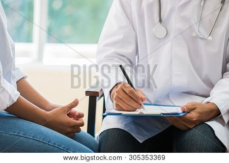 Young Asian Woman Patient Having Consultation With Doctor, Gynecologist Or Psychiatrist And Examinin