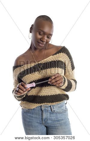 Black African American Female Model Holding A Hammer Repair Tool Looking Independent And Self Relian