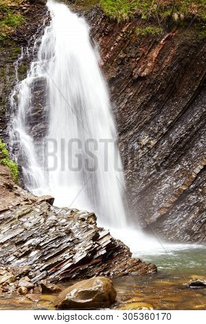 Impressive Shot Of Raging Waterfall In Forest, White Busy Stream Of Water Flowing Along Cliffs, Incr