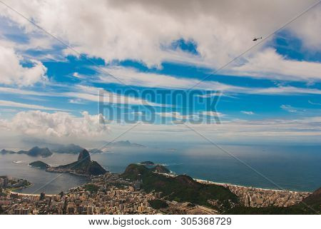 Rio De Janeiro, Sugar Loaf, Brazil: Mountain Resembling Inverted Funnel Behind Urca Hill. Tourist Si