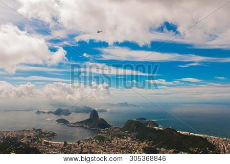 Rio De Janeiro, Sugar Loaf, Brazil: Mountain Resembling Inverted Funnel Behind Urca Hill. Tourist Si