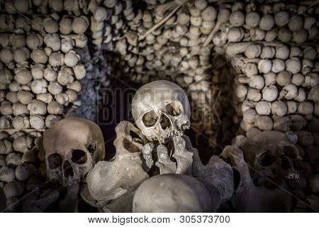 Human Skulls And Bones. Gothic Vault. Mass Grave. Texture. Kostnice In Kutna Hora, Czech Republic