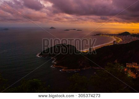 Night View Of Copacabana Beach, Urca And Botafogo From Sugar Loaf In Rio De Janeiro