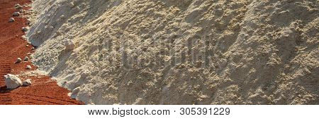 Quartz Sand And Minium In The Warehouse Of Raw Materials, Cement Production. Web Banner For Your Des