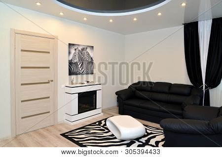 Kaliningrad, Russia - May 18, 2019: The Living Room With An Electric Fireplace. Interio