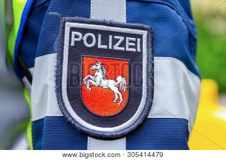 German Police Emblem Weared By An Officer. The German Word Polizei, Means Police.