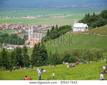 Sumuleu Ciuc, Romania- 08 June 2019: Gathering Catholic Pilgrims To Celebrate The Pentecost, Local C