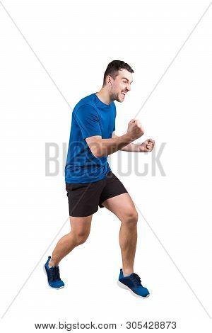 Full Length Portrait Of Young Man Athlete With Hands Raised, Celebrating Victory. Self Overcome Conc