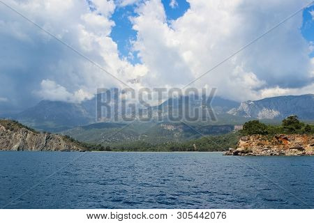 Mountain View In The Clouds From The Mediterranean Sea In Turkey