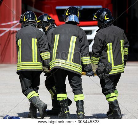 Firemen Rescuers Stretcher Bearer After The Accident