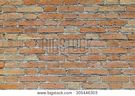 Wall Made With Red Bricks And Mortar Without People