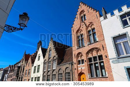 Street View With Traditional Medieval Houses In Bruges , Belgium